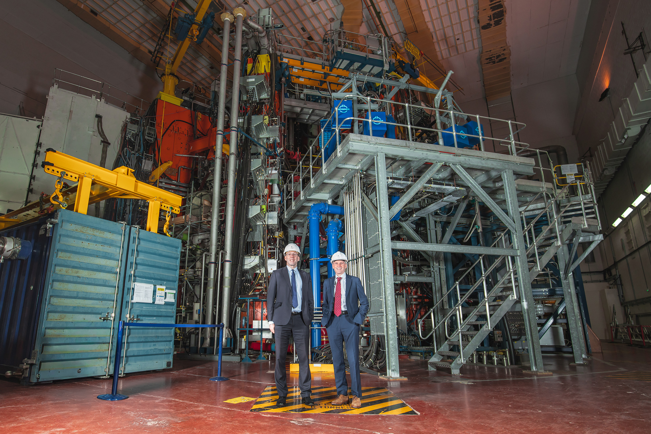 TAE Technologies CEO, Michl Binderbauer, and UKAEA CEO, Tim Bestwick, with Joint European Torus (JET) at Culham Campus
