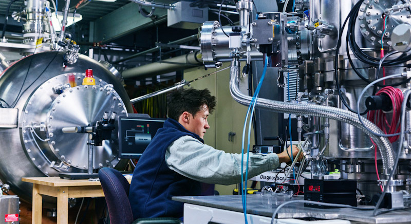 A technician working at TAE Technologies